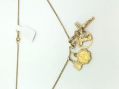 18ct Gold Charm Necklace set with four 18ct gold charms. 6.3g