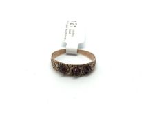 Rose cut garnet set band, three rose cut stones set within an engraved rose gold band, testing as