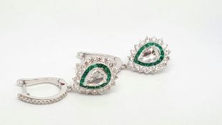 Emerald and diamond drop earrings, central pair rose cut diamond weighing an estimated 1.67ct