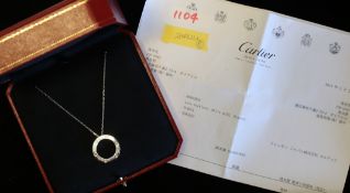 Cartier diamond set Love necklace, 23mm diameter 18ct white gold disc, set with three brilliant