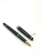 Mont Blanc roller ball, black with gilt detail, closed top