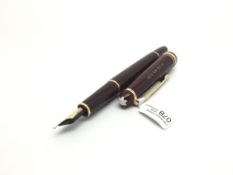 Mont Blanc red cased fountain pen, 14k Mont blanc signed nib, red lacquer case with gilt detail,