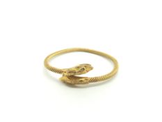 Heavy 21ct gold Torque Bangle with Serpent like terminals. 40.08g