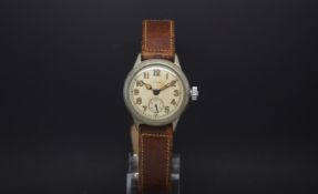 A Gentlemen's Elgin military navigators watch from the USA ord dept. The watch has a cream dial with