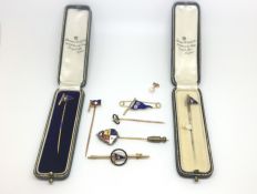 A collection of gold flag stick pins. Two cased. Various gold marks, Also a single 9ct pearl