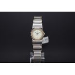 Ladies' Omega Contstellation, white dial with round hour markers, diamond set bezel, steel and