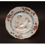 A Chinese Imari plate, Qing dynasty, Circa 18th century , of barbed circular form, painted with