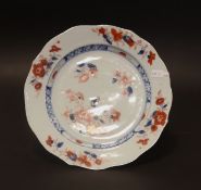 A Chinese Imari plate, Qing dynasty, Circa 18th century , of barbed circular form, painted with