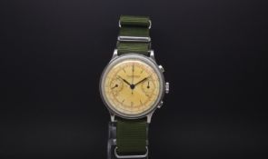 Rare oversized gentlemen's Eberhard chronograph stainless steel watch. circa 1940s. Two register