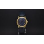 Gentlemen's 18ct Tissot automatic, blue dial with gold roman numerals, 34mm beveled case, exhibition