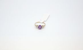 Amethyst and diamond dress ring, oval cut amethyst with an illusion set stone to each side, ,