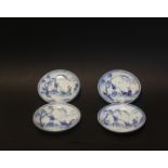 Four early 18thC Chinese blue and white saucers decorated with boys by a tree with an elder lady.(