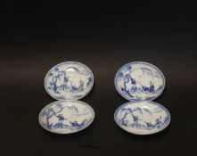 Four early 18thC Chinese blue and white saucers decorated with boys by a tree with an elder lady.(