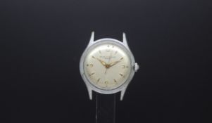 Vintage Baume & Mercier,, circular dial with dagger and Arabic hour markers, outer seconds track,