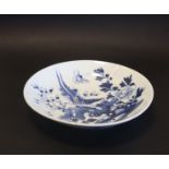 19th century Chinese blue and white shallow dish of bird amongst flowers and shrubs, square