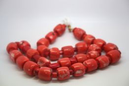 Large coral necklace, 28 large barrel shaped beads approximately 22x18mm, spaced with 29