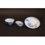 Blue and white porcelain teabowls and saucers, 18th century, painted with pine and island pavilions,