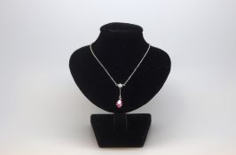 Mappin & Webb - Pink sapphire and diamond drop pendant, pear cut pink sapphire 7x5mm, suspended from