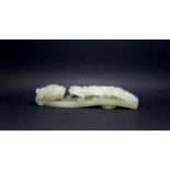 a Chinese carved jade dragon belt hook, fissures, 5.5 ins wide 14cm*2.7cm