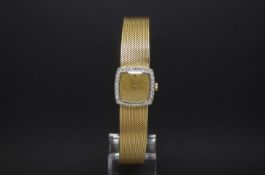 Ladies' vintage L.U.C - Chopard wristwatch, 18ct and diamond set, champagne dial with baton hour