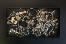 A selection of mostly silver charms bracelets and stone set charms Gross Weight 394.0g