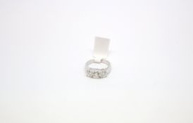 Diamond three stone ring, three brilliant cut diamonds claw set, estimated total diamond weight 2.