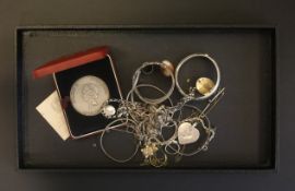 A selection of mainly jewellery, including silver bangles, silver chains and Ellizabeth II silver