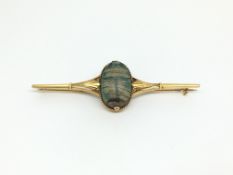Egyptian revival, scarab battle brooch, 21x12mm carved scarab beetle set within a detailed bar