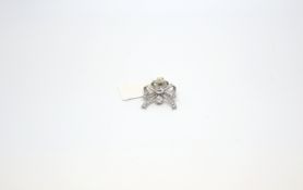 Old cut diamond set bow pendant, centre old cut diamond set within an old cut diamond set bow mount,