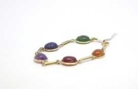 Scarab beetle bracelet, set with an adventurine quartz, lapiz lazuli, amethyst, cornelian and