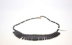 9ct black bead and bar fringe necklace , black bars spaced with yellow metal spacers, black bead
