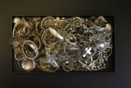 A selection of mostly silver items of jewellery including bangles and bracelets Gross Weight 4016gr