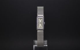 Ladies Art deco sapphire and diamond Audemars Piguet cocktail watch, rectangular dial with Deco