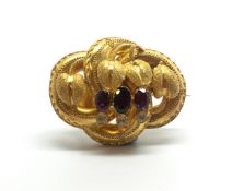 An antique gem set yellow metal brooch. 9.9g