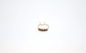 Garnet five stone ring, round cut garnets, hallmarked 9ct, ring size N