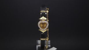 Ladies diamond set DeLaneau dress watch, gilt heart shaped dial with a border of brilliant cut