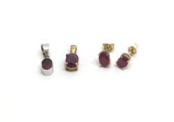Three pieces of gem set 9ct gold consisting of two pendants and a pair of earrings 2.4g