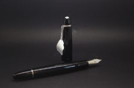 Mont Blanc fountin pen, screw top, 14k nib, black with steel detail