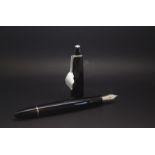 Mont Blanc fountin pen, screw top, 14k nib, black with steel detail