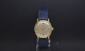 Vintage 18ct Ebel, silvered dial with gold Roman and baton hour markers, outer track, 32mm case,
