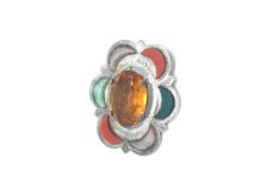 A silver Stone set brooch, Believed to be a Citrine centre stone with Hardstone shell set around the