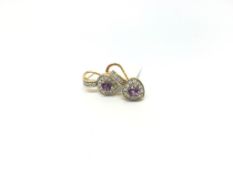 Amethyst and diamond earrings, heart cut amethysts set with a border of diamonds, yellow and white