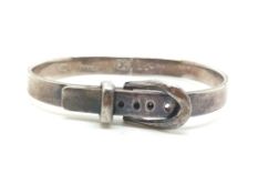 a silver bangle in Buckle style design, marked and tested as silver, approx gross weight 30gr