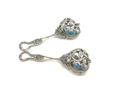 a pair of silver babies rattles, marked and tested as silver, approx gross weight 24gms