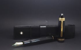 A Mont Blanc 75th Anniversary special edition set with a small diamond at the side of the cap,