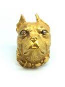 A dog brooch in 14ct gold. 10.3g. Approximately 4.4cm in height. Diamond set eyes.