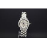 Ladies Dior "Christal" Diamond set bezel mother of peal dial plus a faceted stone link stainless