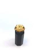 A Heavy 18ct Gold Signet Ring. The ring engraved with lion rampant. 11.1g and hallmarked for 18ct