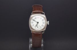 Silver cased trench watch, white dial with red twelve, subsidary seconds dial, 30mm case size, brown