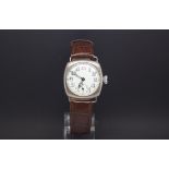 Silver cased trench watch, white dial with red twelve, subsidary seconds dial, 30mm case size, brown